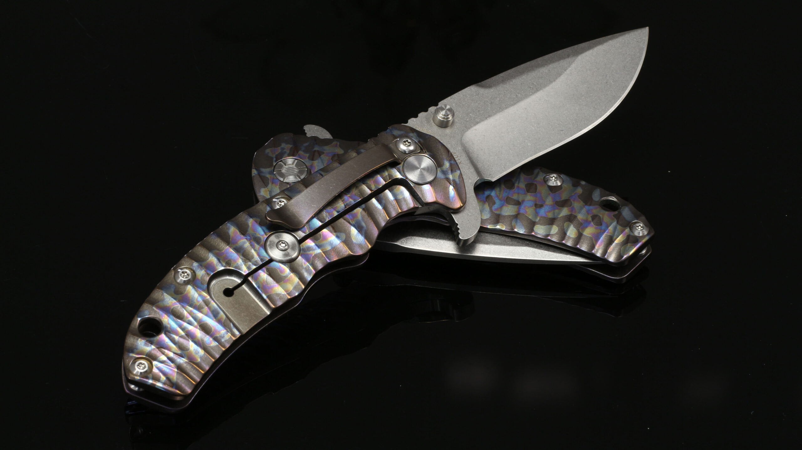 Kizer V3 401X – אולר EDC מטיטניום 6Al4V בגוון סגול־קשת ולהב CPM-S35VN 4 Kizer V3 401X – אולר EDC מטיטניום 6Al4V בגוון סגול־קשת ולהב CPM-S35VN – תמונה 4